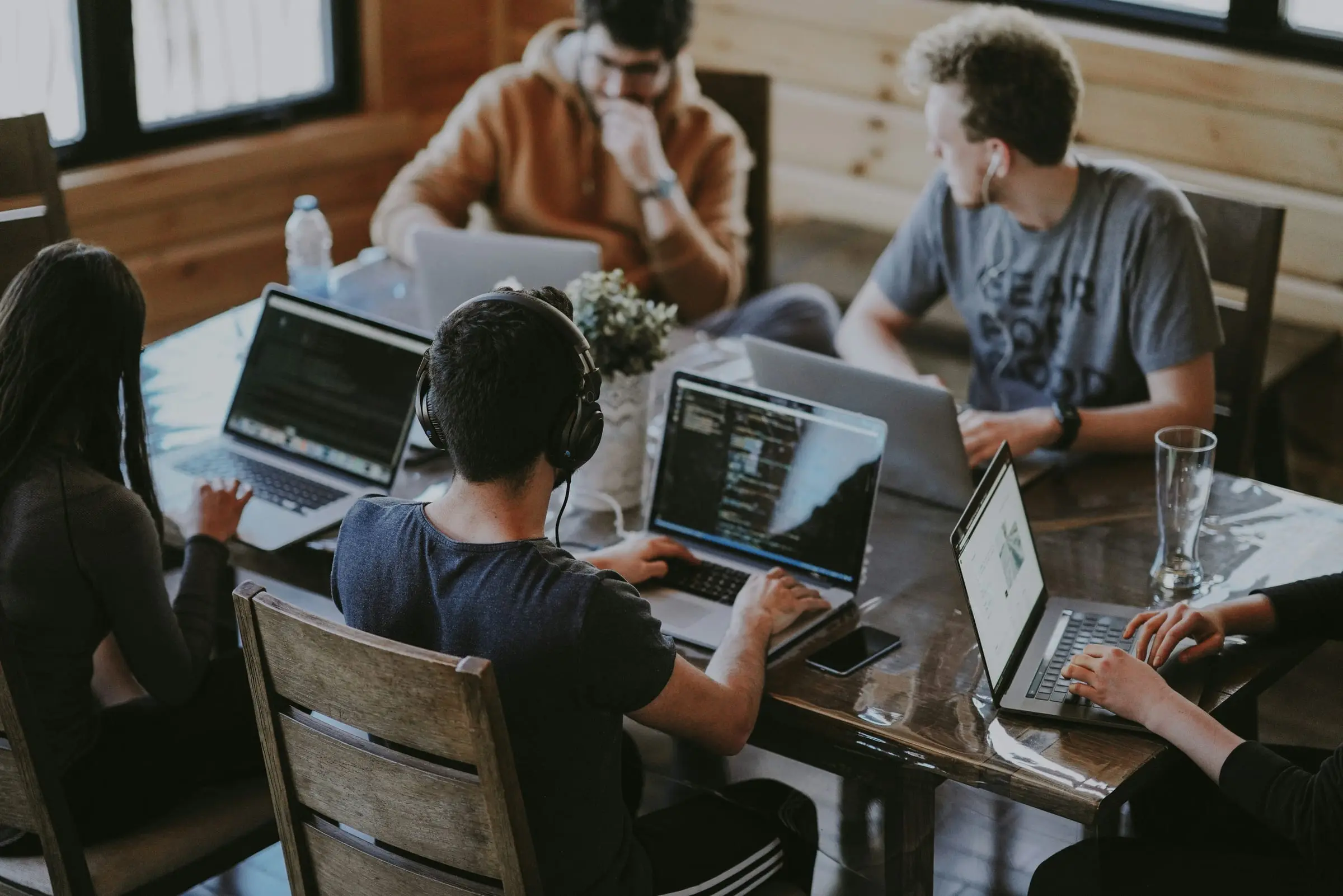 A team working together on laptops