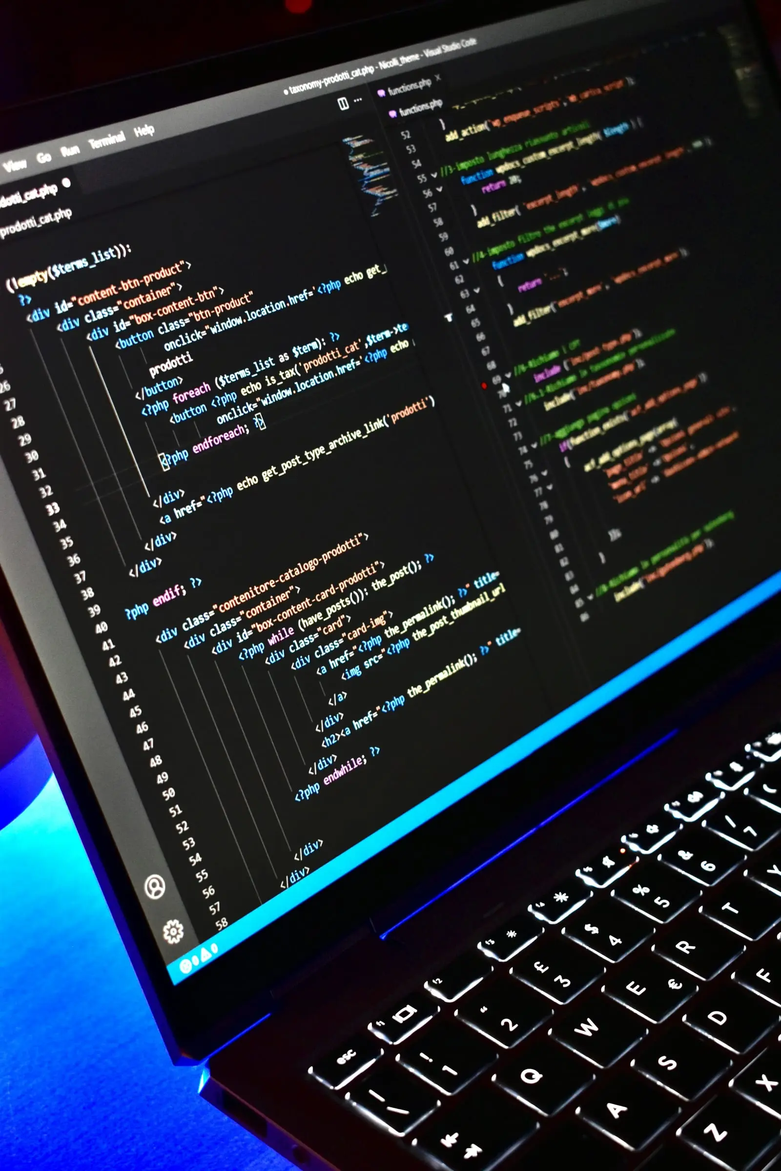 Code on a laptop screen in a developer workspace
